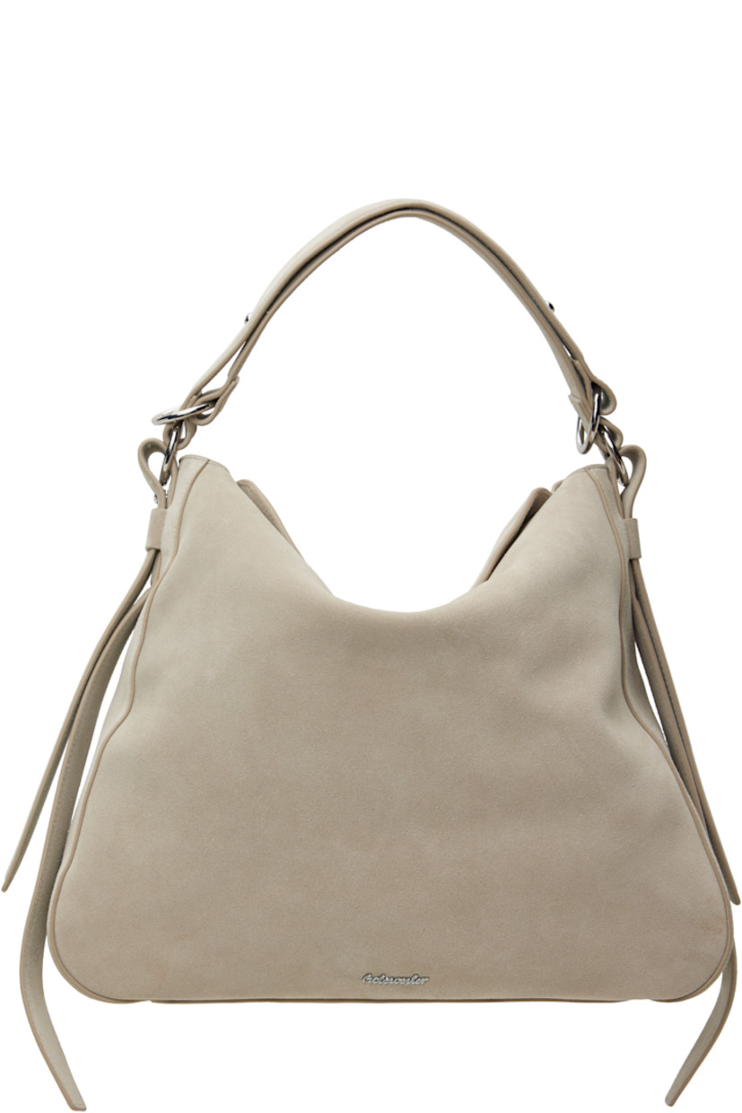 Suede shoulder bag in gray.

· Adjustable shoulder strap
· Logo hardware at face
· Adjustable and detachable post-stud strap at sides
· Magnetic flap closure
· Zip pocket at interior
· Cotton twill lining
· Silver-tone hardware
· H14.75" x W16.5" x D4.75"

Supplier color: Lt. grey