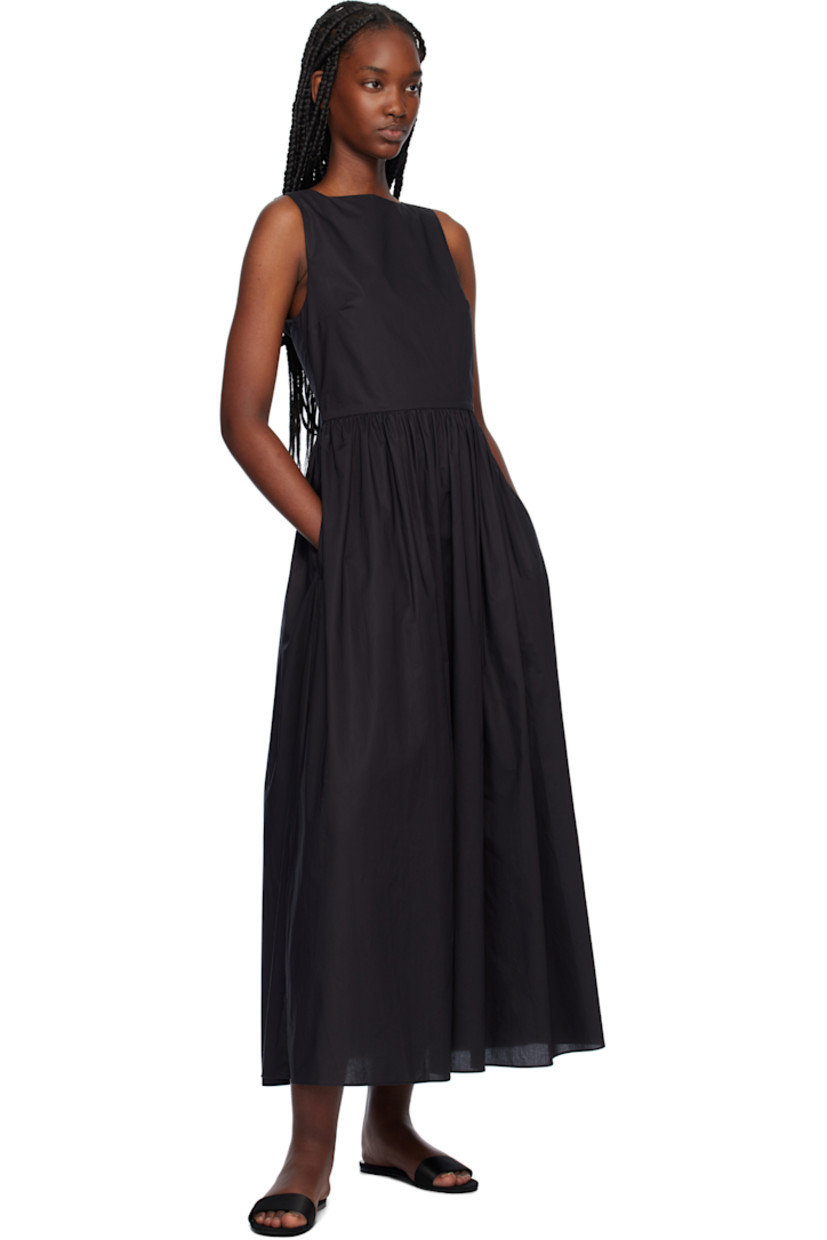 Organic cotton poplin midi dress.

· Boat neck 
· Gathering at waist
· Seam pockets
· Concealed zip closure at side seam
· Self-tie straps at open back
· Concealed zip closure at back 
· Unlined

Supplier color: Black