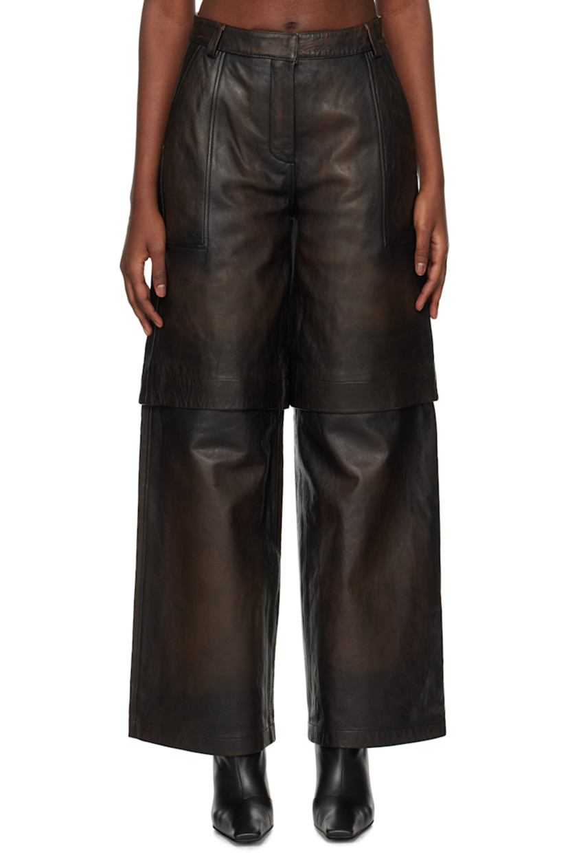Wide-leg grained leather zip-off pants. Fading throughout.

· Belt loops
· Four-pocket styling
· Zip-fly
· Zip fastening at knees for shorts styling
· Full satin lining

Supplier color: Brown
