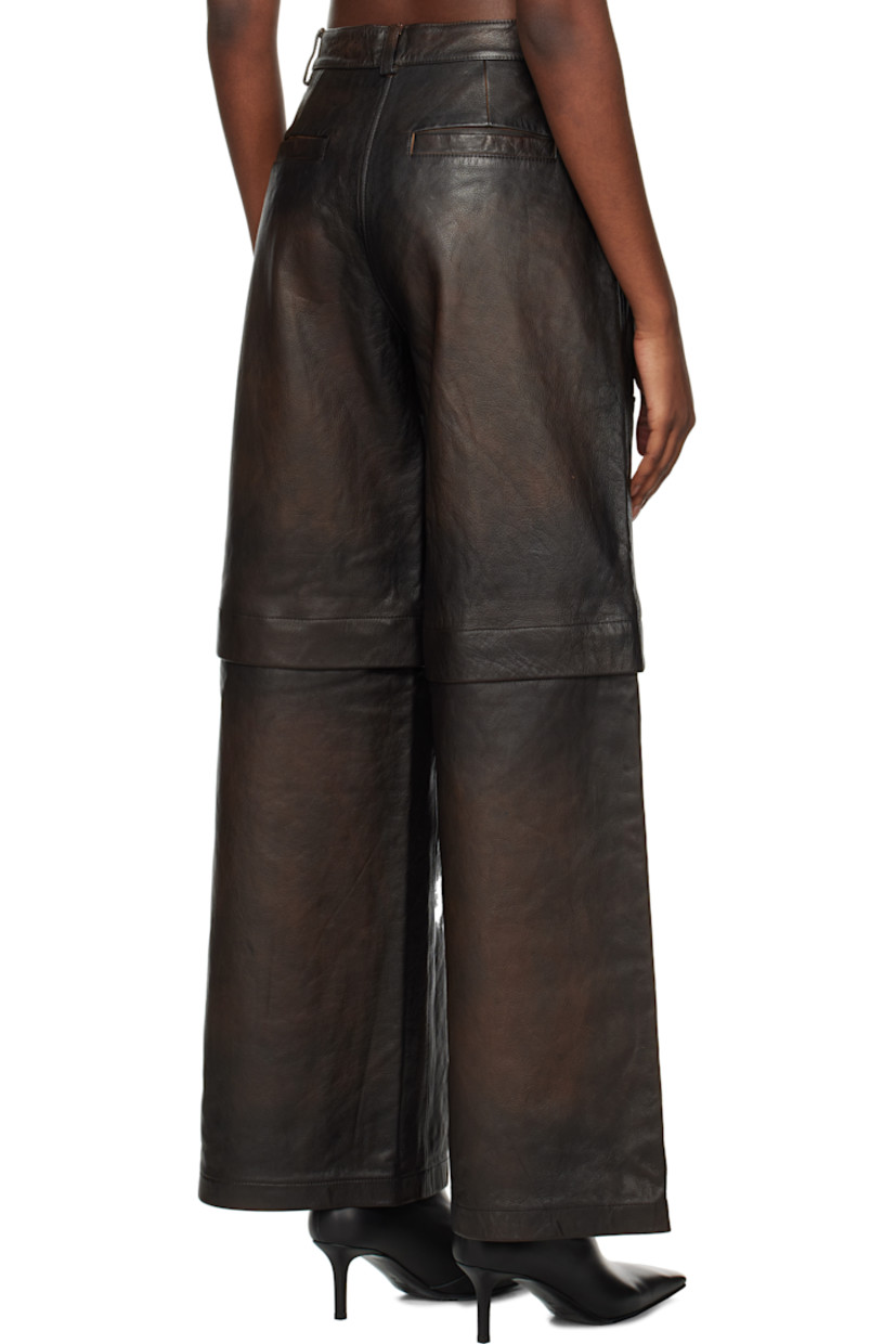 Wide-leg grained leather zip-off pants. Fading throughout.

· Belt loops
· Four-pocket styling
· Zip-fly
· Zip fastening at knees for shorts styling
· Full satin lining

Supplier color: Brown