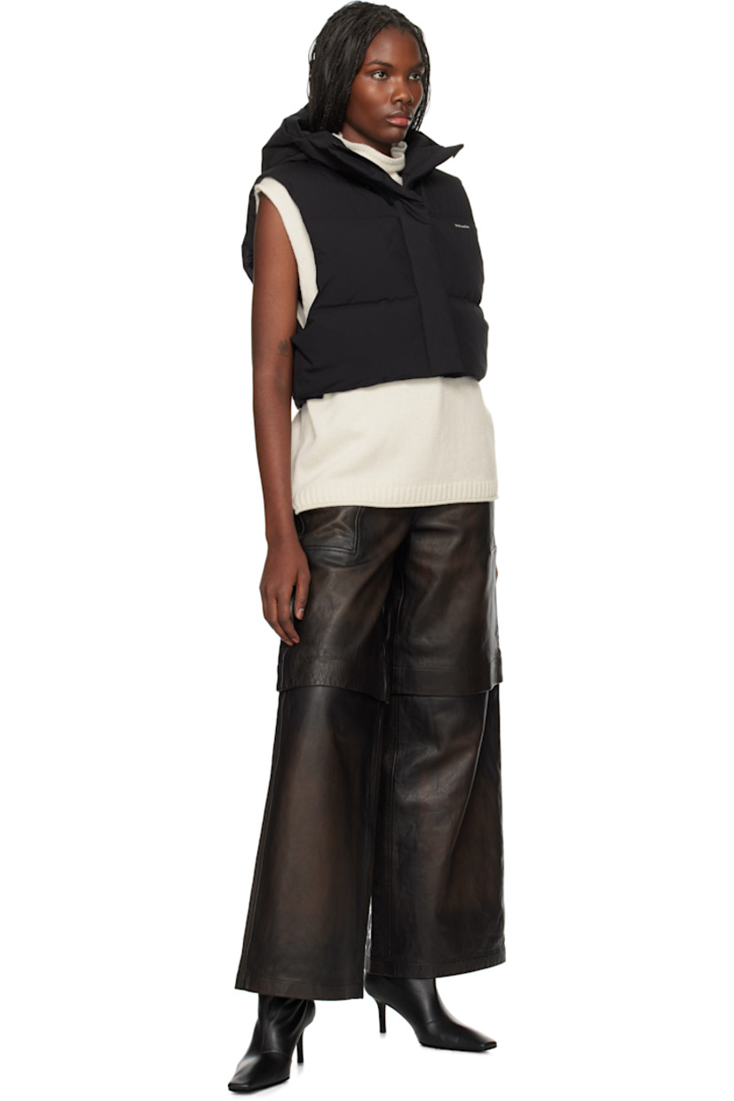 Wide-leg grained leather zip-off pants. Fading throughout.

· Belt loops
· Four-pocket styling
· Zip-fly
· Zip fastening at knees for shorts styling
· Full satin lining

Supplier color: Brown