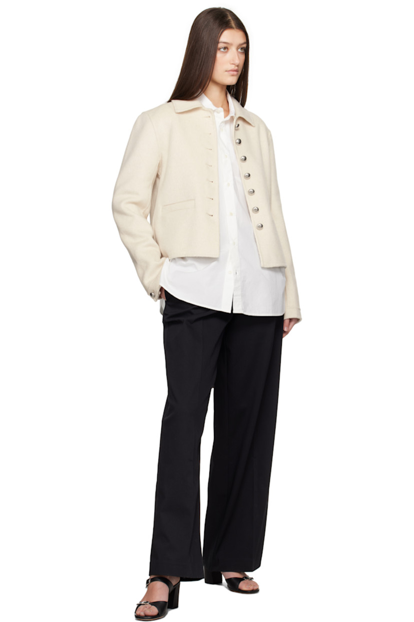 Straight-leg GOTS-certified organic cotton twill trousers. 

· Belt loops 
· Four-pocket styling 
· Zip-fly
· Single pleat at front legs  

Supplier color: Black