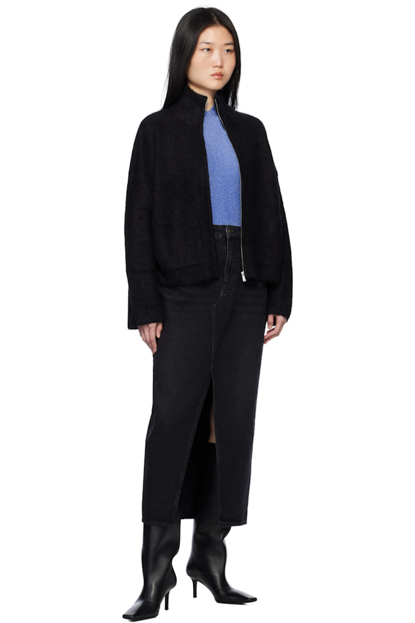 Non-stretch denim maxi skirt. Fading throughout. 

· High-rise 
· Belt loops 
· Five-pocket styling 
· Zip-fly 
· Central vent at front hem 
· Leather logo patch at back waistband 

Supplier color: Black