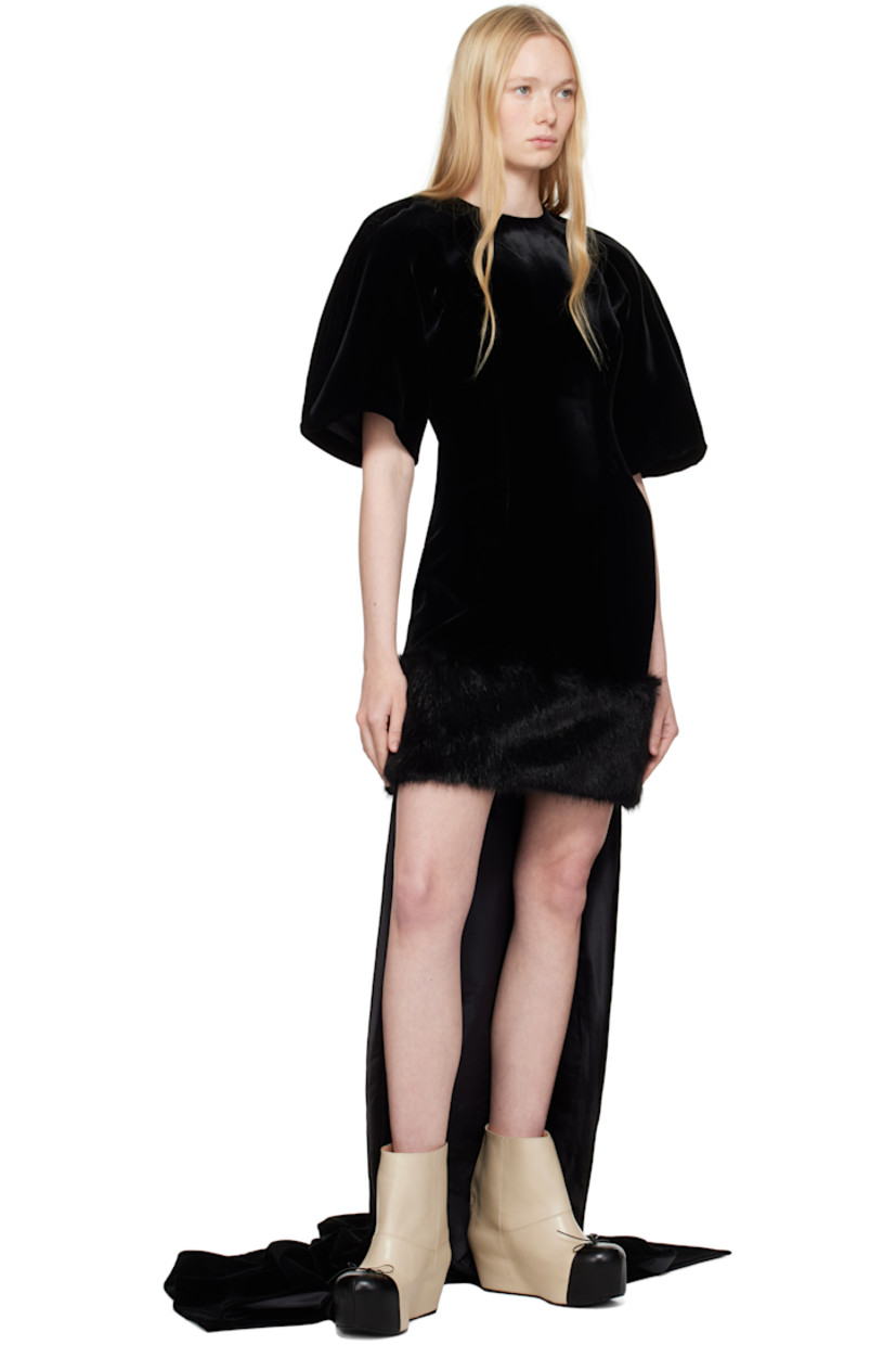 Cotton velvet minidress.

· Round neck
· Faux-fur trim at hem and train
· Pinched seam at sleeves
· Full silk satin lining

Supplier color: Black