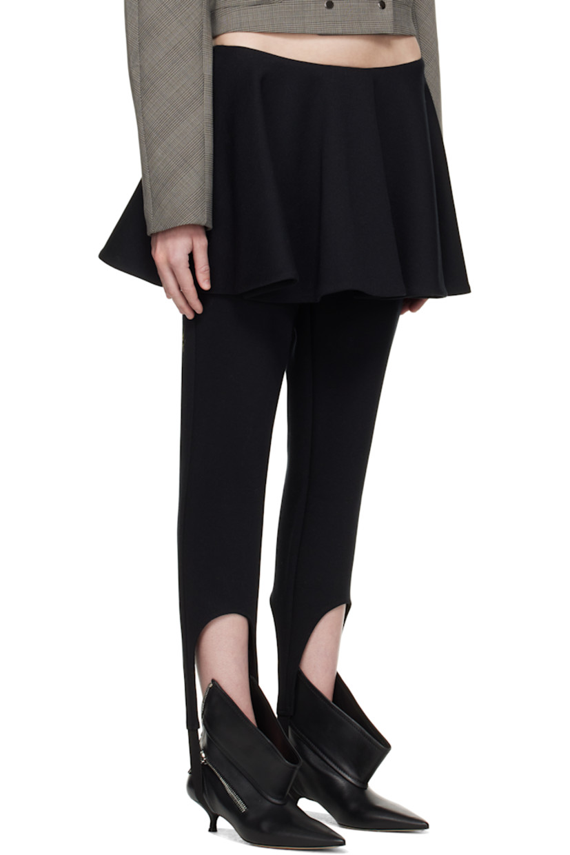 Cotton-blend jersey leggings.

· Skirt-style overlay at waist
· Elasticized stirrup at cuffs
· Zip closure at back
· Partial jersey lining

Supplier color: Black