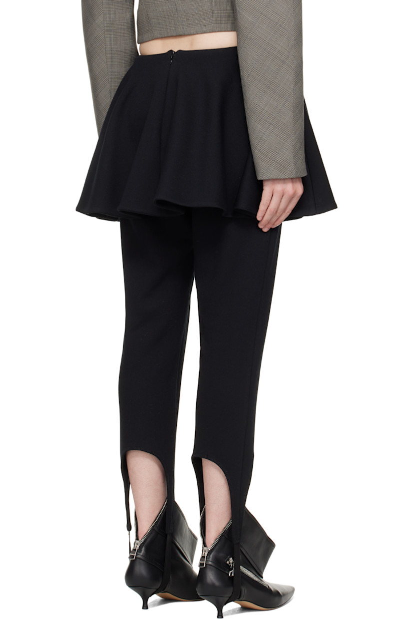 Cotton-blend jersey leggings.

· Skirt-style overlay at waist
· Elasticized stirrup at cuffs
· Zip closure at back
· Partial jersey lining

Supplier color: Black