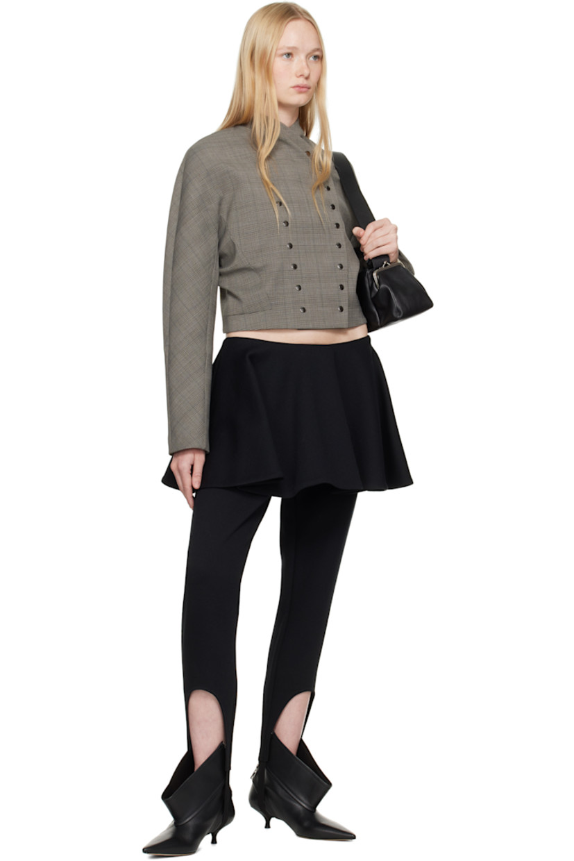 Cotton-blend jersey leggings.

· Skirt-style overlay at waist
· Elasticized stirrup at cuffs
· Zip closure at back
· Partial jersey lining

Supplier color: Black