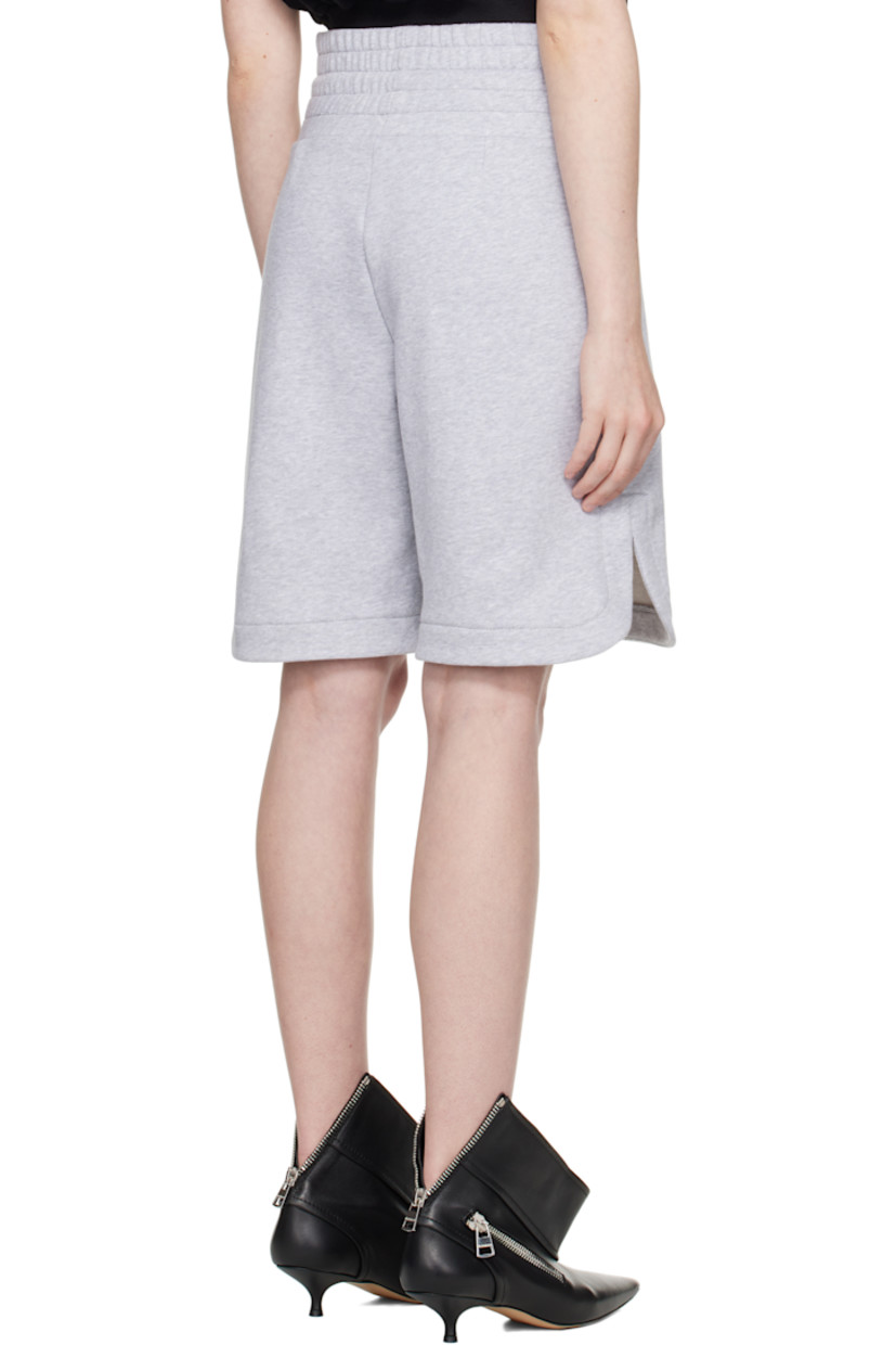 Stretch French terry shorts.

· Drawstring at elasticized waistband
· Vented cuffs

Supplier color: Grey melange