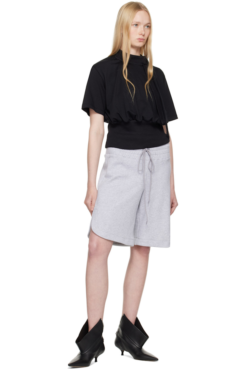 Cotton jersey T-shirt.

· Rib-knit mock neck and hem
· Extended trim at collar

Supplier color: Black