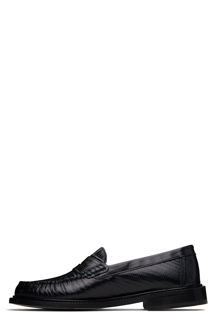 Handcrafted lizard-embossed leather loafers in black.

· Moc toe
· Strap with cutout at vamp
· Buffed leather and suede lining
· Serrated edge at welt
· Stacked leather heel with rubber injection
· Leather sole

Supplier color: Black lizard