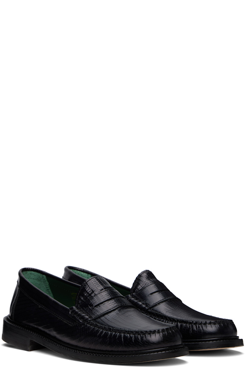 Handcrafted lizard-embossed leather loafers in black.

· Moc toe
· Strap with cutout at vamp
· Buffed leather and suede lining
· Serrated edge at welt
· Stacked leather heel with rubber injection
· Leather sole

Supplier color: Black lizard