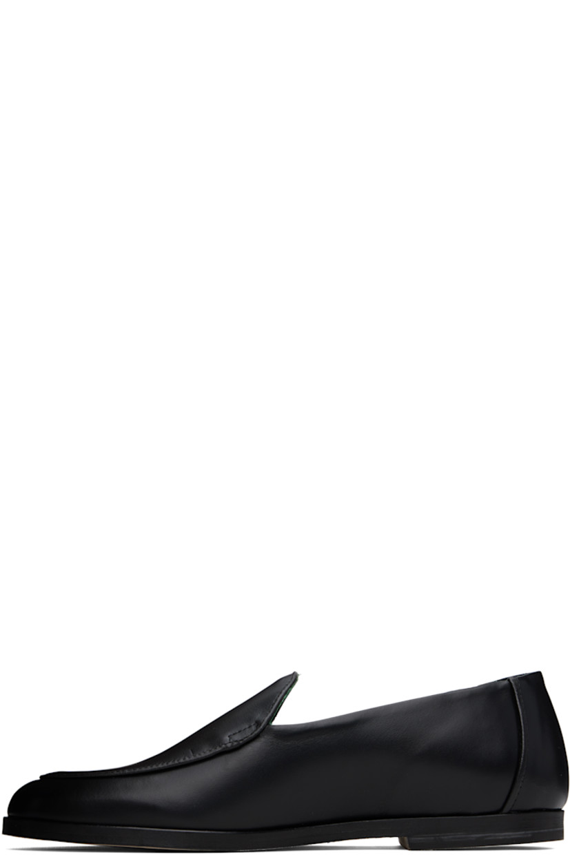 Handcrafted nappa leather loafers in black.

· Moc toe
· Buffed leather and suede lining
· Stacked leather heel with rubber injection
· Leather sole

Supplier color: Black