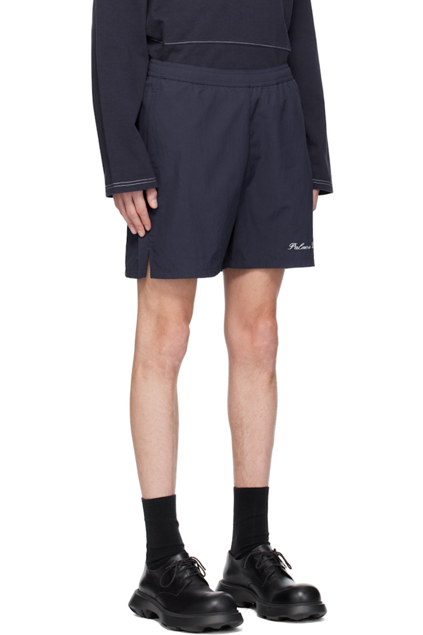 Polyester taffeta shorts.

· Concealed drawstring at elasticized waistband
· Two-pocket styling 
· Logo embroidered at leg
· Vented cuffs

Supplier color: Dark blue