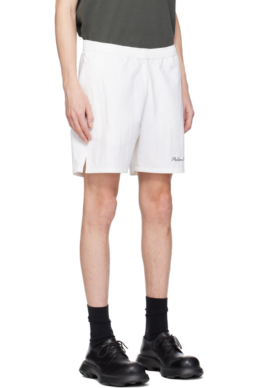 Polyester taffeta shorts.

· Concealed drawstring at elasticized waistband
· Two-pocket styling 
· Logo embroidered at leg
· Vented cuffs

Supplier color: White