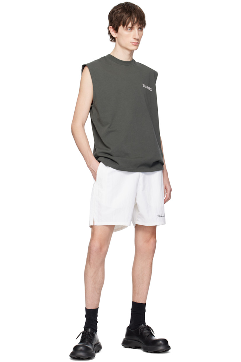 Polyester taffeta shorts.

· Concealed drawstring at elasticized waistband
· Two-pocket styling 
· Logo embroidered at leg
· Vented cuffs

Supplier color: White