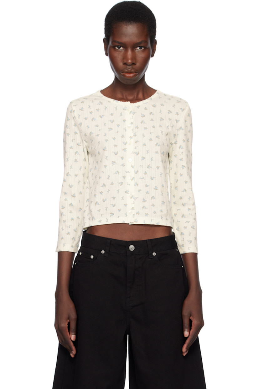 Pointelle-knit stretch cotton cardigan. Floral pattern printed throughout. 

· Picot trim at crewneck
· Button closure
· Logo embroidered at front hem
· Cropped hem
· Logo-engraved mother-of-pearl hardware

Supplier color: Creamflower