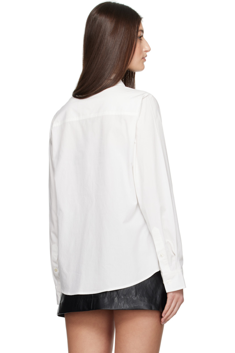 Rayon- and cotton-blend poplin shirt.

· Spread collar
· Button closure
· Button fastening at front for alternate styling
· Shirttail hem
· Pleated adjustable single-button barrel cuffs

Supplier color: White