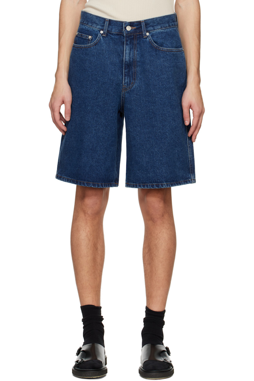 Non-stretch denim shorts.

· Belt loops
· Five-pocket styling
· Zip-fly
· Hammer loop at outseam
· Leather logo patch at back waistband
· Logo-engraved silver-tone hardware
· Contrast stitching in tan

Supplier color: Classic blue