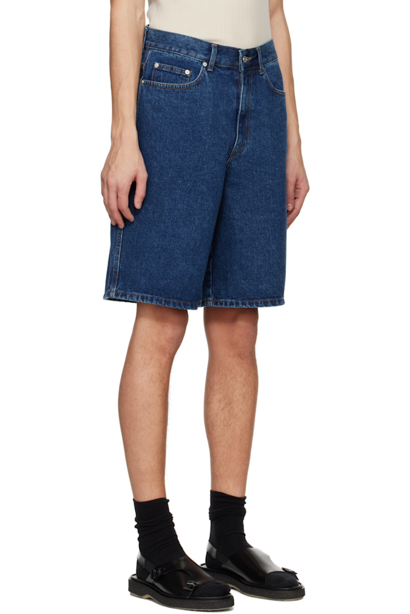 Non-stretch denim shorts.

· Belt loops
· Five-pocket styling
· Zip-fly
· Hammer loop at outseam
· Leather logo patch at back waistband
· Logo-engraved silver-tone hardware
· Contrast stitching in tan

Supplier color: Classic blue