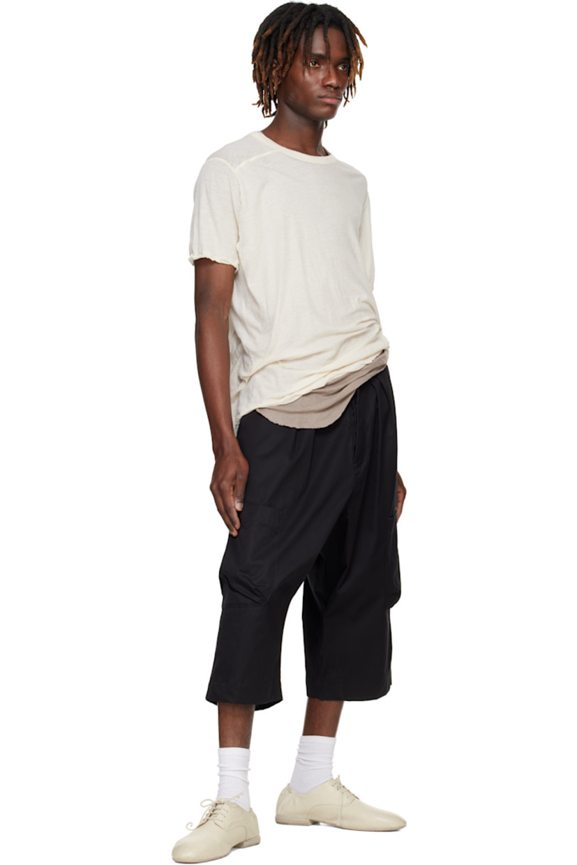 Ventile® cotton gabardine cargo pants.

· Belt loops
· Concealed drawstring at waistband
· Four-pocket styling
· Button fly
· Pleats at front
· Cropped legs
· Patch pocket at outseams

Part of the O-Project collection.

Supplier color: Black
