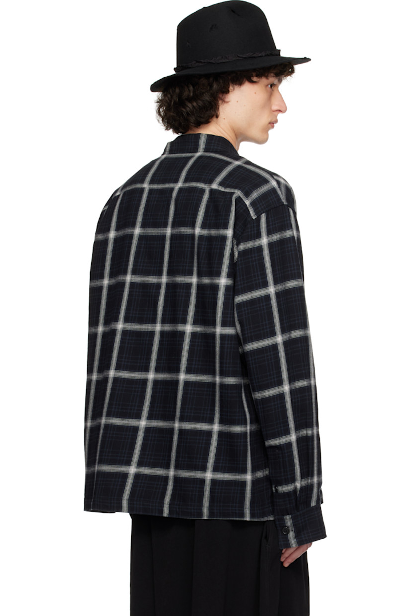 Cotton flannel jacket. Check pattern throughout.

· Spread collar
· Two-way zip closure
· Zip pocket at chest
· Welt pockets
· Buttoned barrel cuffs

Supplier color: Black check