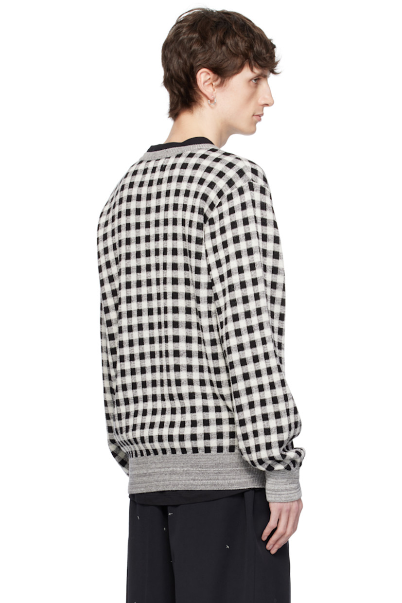 Knit wool- and cotton-blend sweater.  

· Jacquard check pattern throughout. 
· Rib-knit crewneck, hem, and cuffs

Supplier color: Black/White