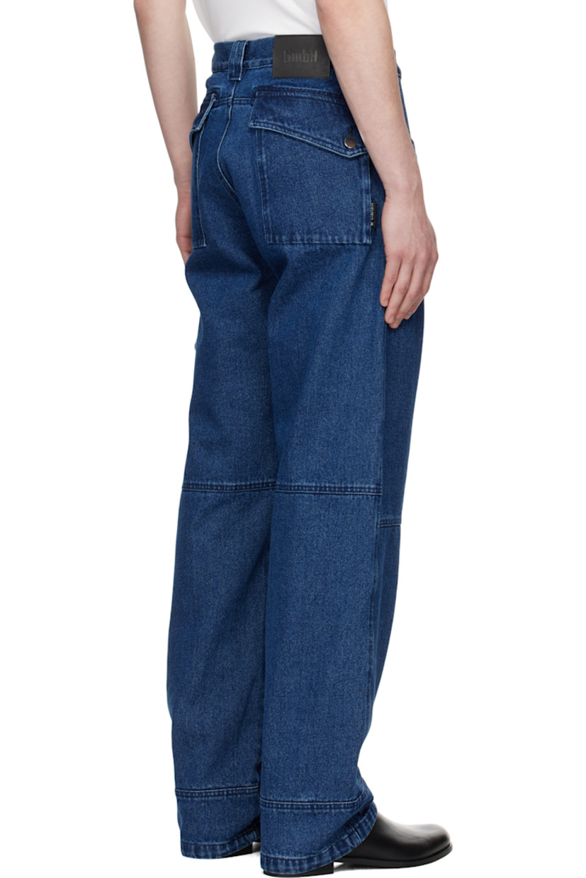 Non-stretch organic cotton denim jeans. Fading throughout.

· Paneled construction
· Belt loops
· Six-pocket styling
· Zip fly
· D-ring at front waist
· Patch pocket and cargo pocket at outseam
· Leather logo patch at back waistband
· Logo flag at back pocket
· Logo-engraved silver-tone hardware

Supplier color: Indigo