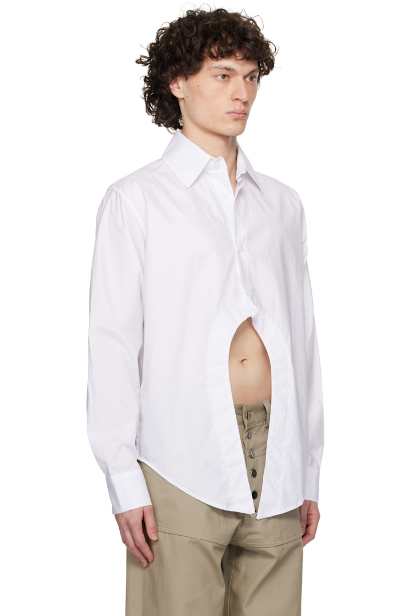 Polyester poplin shirt.

· Spread collar
· Button closure
· Cutout at modified shirttail hem
· Buttoned barrel cuffs
· Logo-engraved corozo hardware

Available exclusively at SSENSE.

Supplier color: White