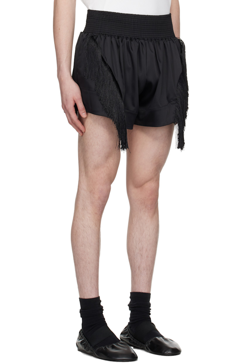 Stretch polyester satin shorts.

· Shirred elasticized waistband
· Two-pocket styling
· Fringed trim at front
· Vented cuffs

Supplier color: Black