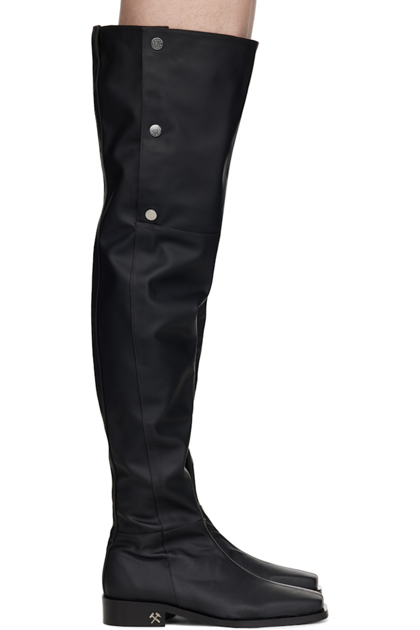 Over-the-knee grained faux-leather boots in black.

· Square toe
· Press-stud fastening at collar 
· Zip closure at  inner side
· Grained faux-leather lining
· Stacked faux-leather block heel with rubber injection
· Logo hardware at heel
· Treaded faux-leather sole
· Logo-engraved silver-tone hardware
· Heel: H1.5"

Supplier color: Black