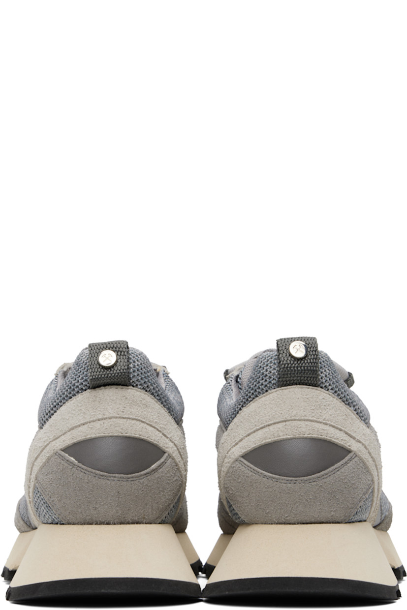 Low-top mesh and faux-suede sneakers in gray.

· Square toe
· Lace-up closure
· Logo patch at padded tongue
· Padded collar
· Pull-loop with logo hardware at heel collar
· Foam rubber midsole
· Treaded rubber sole

Supplier color: Grey/Silver