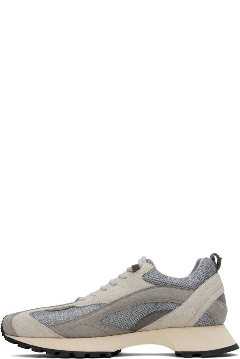 Low-top mesh and faux-suede sneakers in gray.

· Square toe
· Lace-up closure
· Logo patch at padded tongue
· Padded collar
· Pull-loop with logo hardware at heel collar
· Foam rubber midsole
· Treaded rubber sole

Supplier color: Grey/Silver