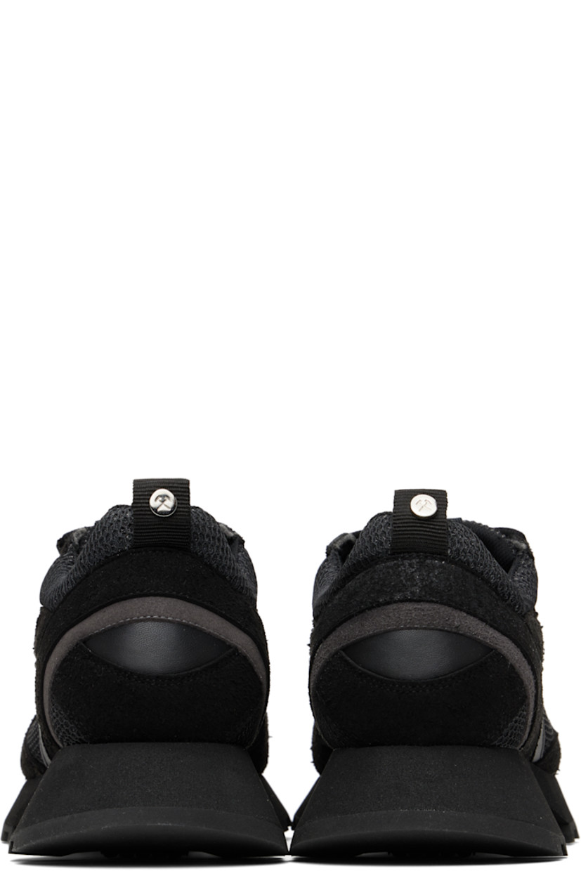 Low-top mesh and faux-suede sneakers in black.

· Square toe
· Lace-up closure
· Logo patch at padded tongue
· Padded collar
· Pull-loop with logo hardware at heel tab
· Mesh lining
· Foam rubber midsole
· Treaded rubber sole

Supplier color: Black