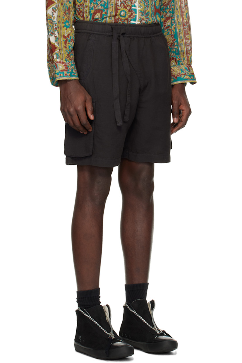 Loose-fit hemp- and cotton-blend broadcloth shorts. 

· Garment-dyed
· Offset drawstring at elasticized waistband
· Four-pocket styling
· Offset mock fly
· Cargo pocket at outseams

Supplier color: Black