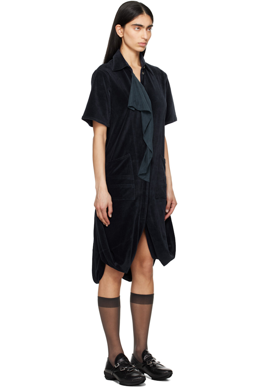 Cotton velour minidress. 

· Paneled construction
· Spread collar
· Concealed button closure
· Draped stretch cupro jersey panel at front
· Patch pockets
· Vented bubble hem 
· Pleats at back waist

Supplier color: Midnight navy/Spruce blue