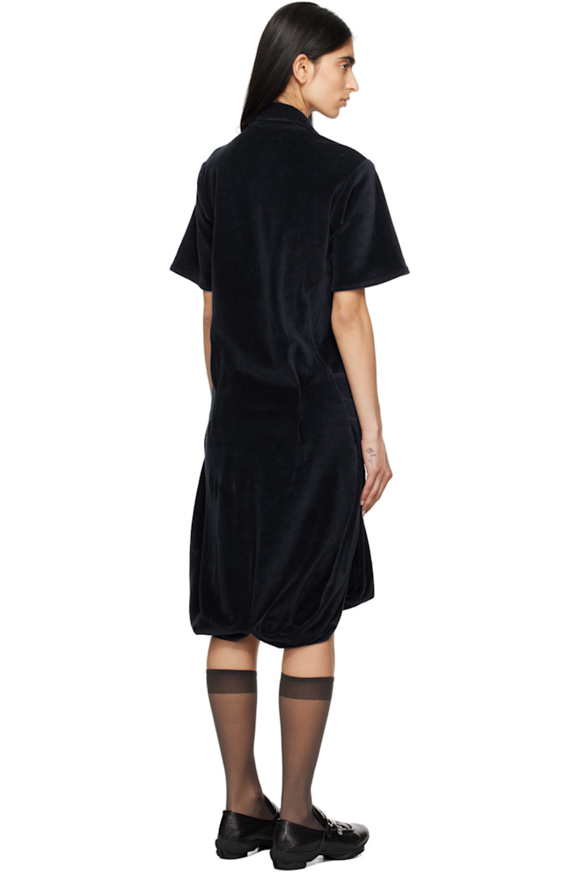Cotton velour minidress. 

· Paneled construction
· Spread collar
· Concealed button closure
· Draped stretch cupro jersey panel at front
· Patch pockets
· Vented bubble hem 
· Pleats at back waist

Supplier color: Midnight navy/Spruce blue