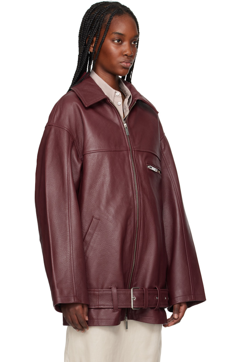 Grained lambskin jacket.

· Spread collar
· Two-way zIp closure
· Zip pocket and welt pockets
· Belt loops and detachable pin-buckle belt at hem
· Full satin lining

Supplier color: Chocolate truffle