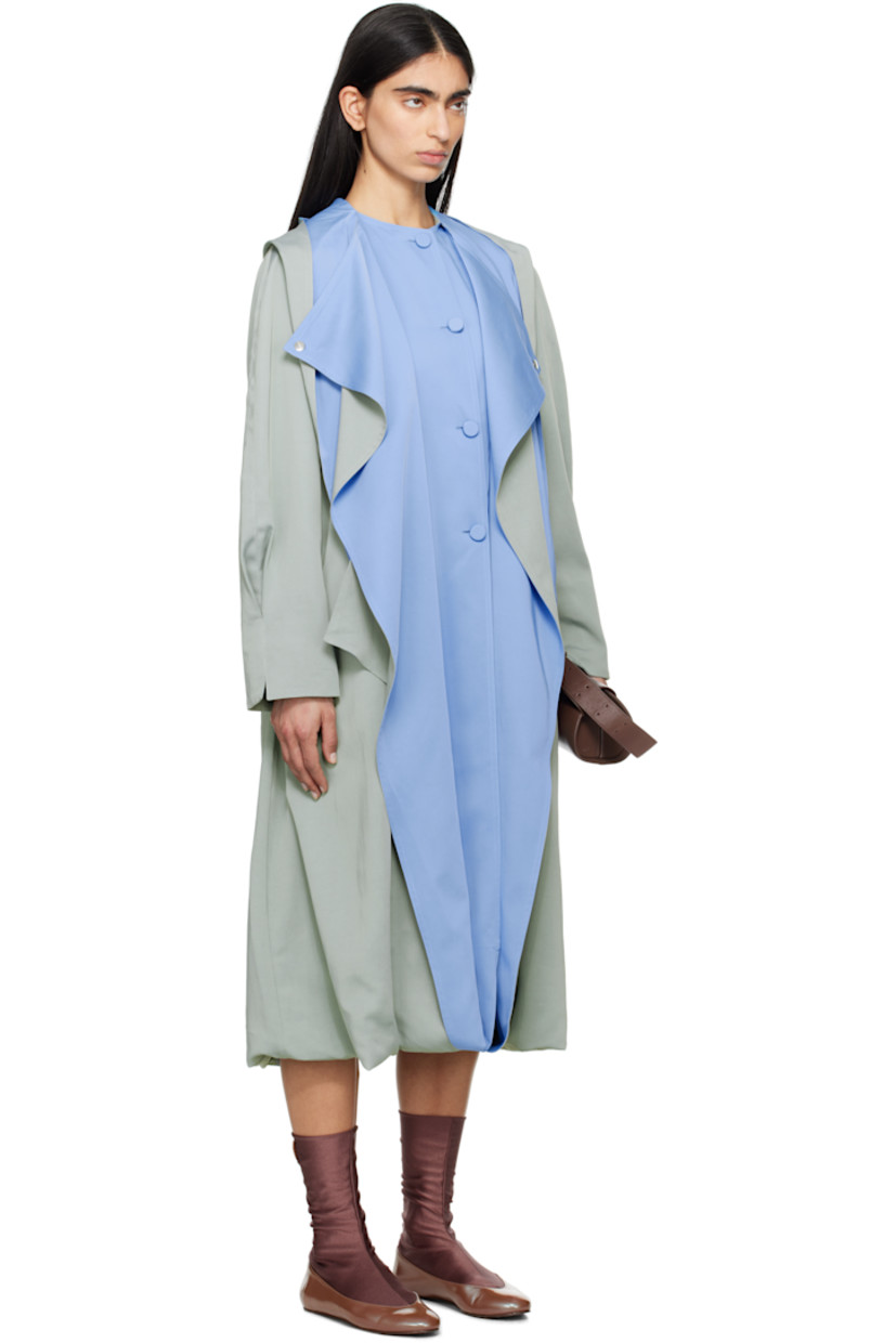 Viscose- and cotton-blend satin twill trench coat.

· Integrated scarf-style hood
· Open front with press-stud fastening at collar
· Welt pockets
· Raglan sleeves
· Pleats at cuffs
· Bubble hem 
· Inverted box pleat at back 

Supplier color: Sage green/Azure blue