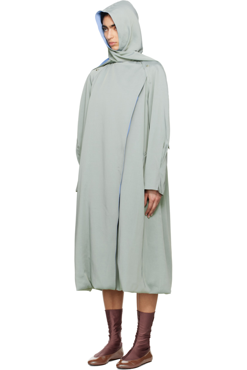 Viscose- and cotton-blend satin twill trench coat.

· Integrated scarf-style hood
· Open front with press-stud fastening at collar
· Welt pockets
· Raglan sleeves
· Pleats at cuffs
· Bubble hem 
· Inverted box pleat at back 

Supplier color: Sage green/Azure blue