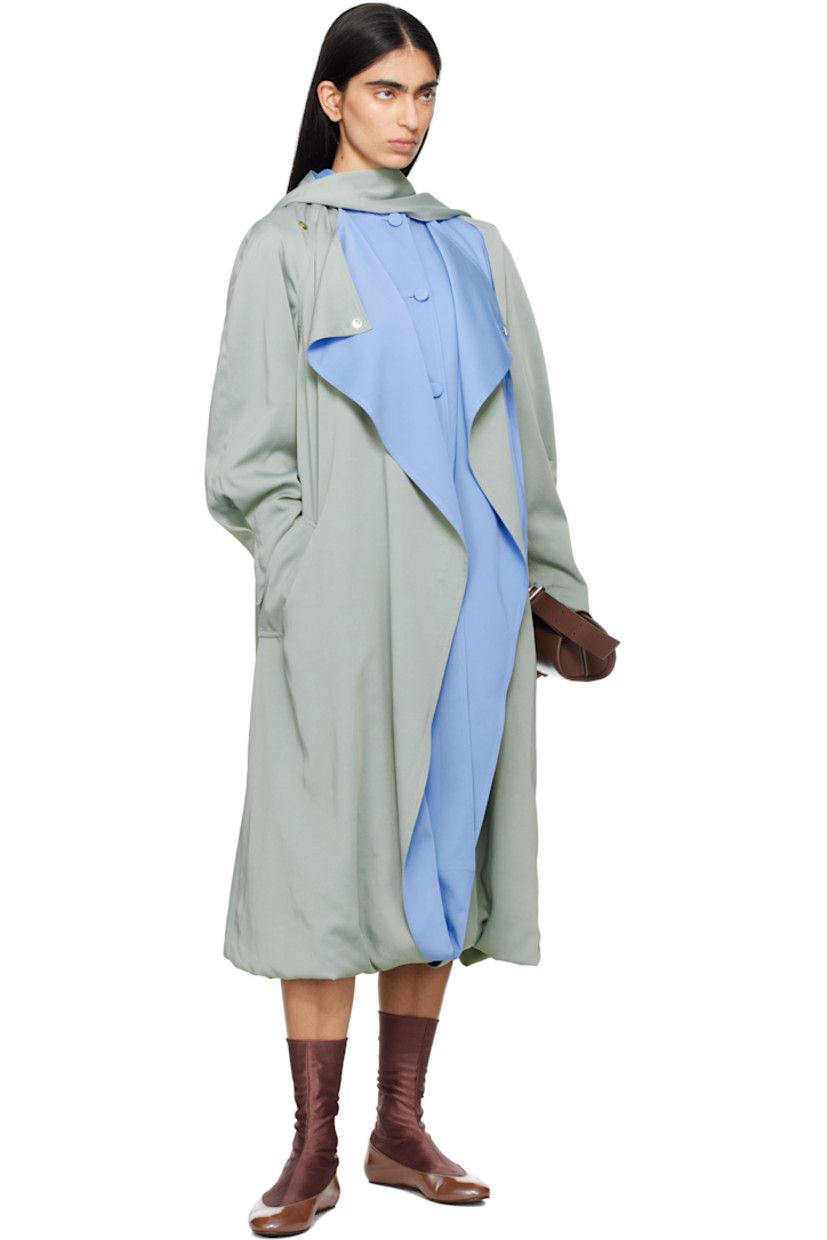 Viscose- and cotton-blend satin twill trench coat.

· Integrated scarf-style hood
· Open front with press-stud fastening at collar
· Welt pockets
· Raglan sleeves
· Pleats at cuffs
· Bubble hem 
· Inverted box pleat at back 

Supplier color: Sage green/Azure blue