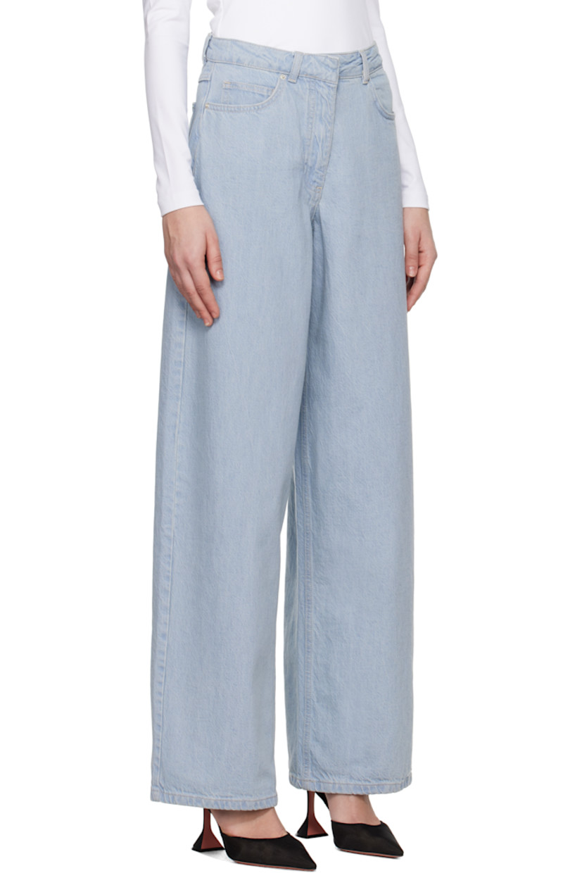 Non-stretch organic cotton denim jeans. 

· Wide-leg
· High-rise
· Belt loops
· Five-pocket styling
· Zip fly
· Logo flag at back pocket
· Logo-engraved silver-tone hardware
· Contrast stitching in off-white

Supplier color: Subdued blue