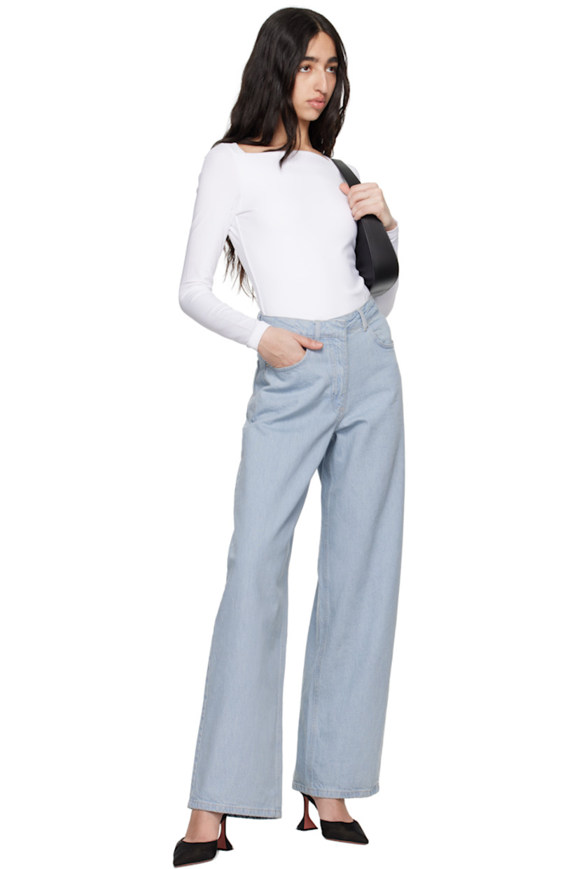 Non-stretch organic cotton denim jeans. 

· Wide-leg
· High-rise
· Belt loops
· Five-pocket styling
· Zip fly
· Logo flag at back pocket
· Logo-engraved silver-tone hardware
· Contrast stitching in off-white

Supplier color: Subdued blue
