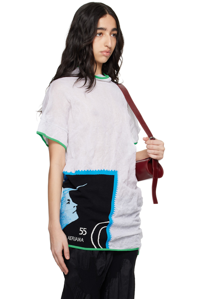 Semi-sheer and crinkled knit cotton-blend T-shirt. Metallic thread detailing throughout.

· Asymmetrical construction
· Rib-knit trim at mock neck, hem, and cuffs
· Intarsia graphic at front
· Dropped shoulder
· Cap sleeves

Supplier color: Star white/Night scape intarsia