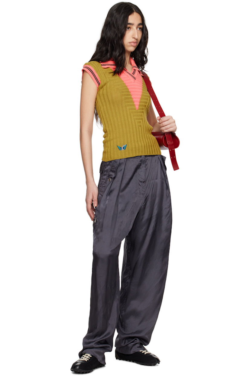 Rib-knit mercerized cotton polo.

· Slim-fit
· Striped spread collar, open placket, and cuffs
· Intarsia panel at front and back
· Logo graphic embroidered at front hem
· Cap sleeves

Supplier color: Ochre/Coral pink