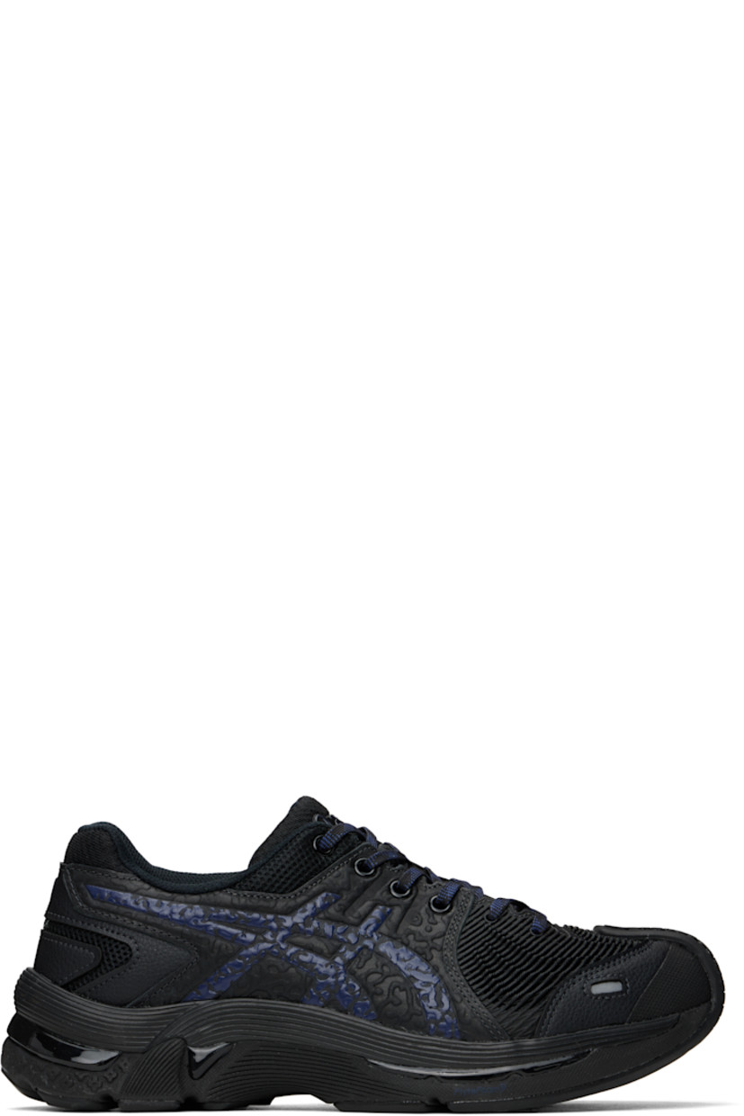 Low-top grained leather, mesh, and rubber sneakers in black and blue.

· Graphic pattern embossed throughout
· Logo embossed at toe and heel tab
· Lace-up closure
· Logo bonded at padded tongue
· Padded collar
· Signature stripes embossed at sides
· Mesh lining
· FLYTEFOAM™ PROPEL foam rubber midsole
· AHAR+ treaded rubber sole with GEL™ technology

Part of the Kiko Kostadinov x Asics collaboration.

Supplier color: Black/Deep blue
