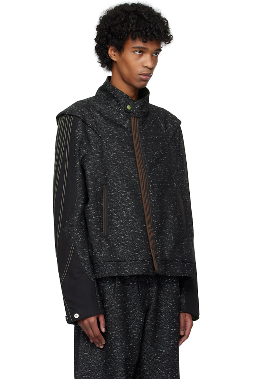 Virgin wool-blend tweed and lyocell-blend barathea jacket.

· Paneled construction
· Press-stud tab at stand collar
· Concealed zip closure
· Striped grosgrain trim at placket and welt pockets
· Elasticized hem
· Pleat at shoulders
· Press-stud tab at cuffs
· Full satin lining
· Contrast stitching in green

Supplier color: Ash black/Black sable