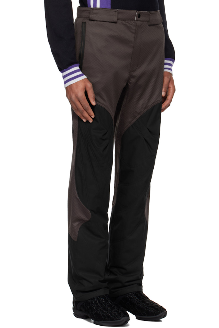 Lyocell- and cotton-blend jersey and barathea trousers. Textured pattern throughout.

· Paneled construction
· Belt loops
· Four-pocket styling
· Zip-fly
· Striped knit trim at front pockets
· Darts at knees
· Zip mesh panels at back legs
· Partially lined

Supplier color: Callisto brown/black sable