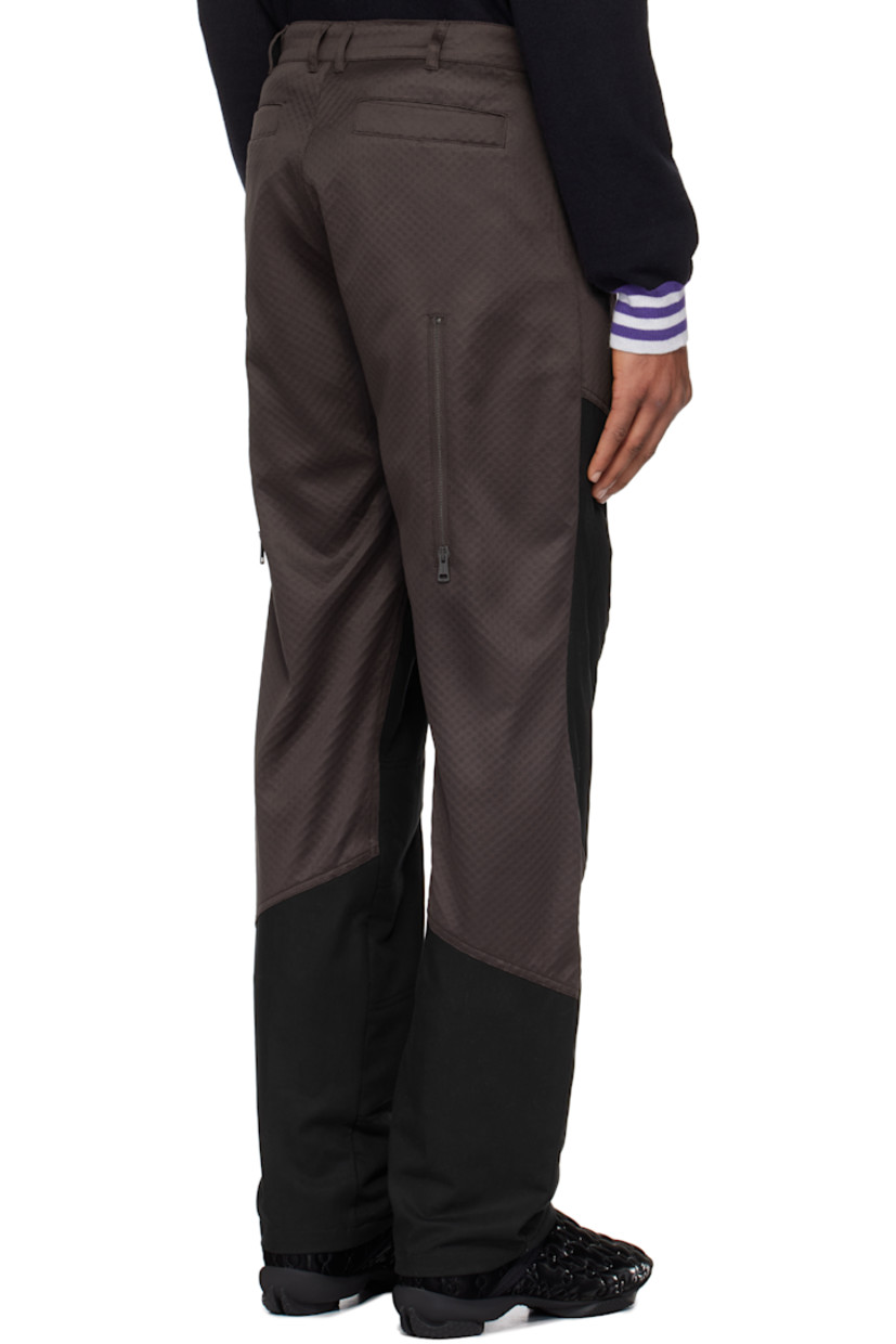 Lyocell- and cotton-blend jersey and barathea trousers. Textured pattern throughout.

· Paneled construction
· Belt loops
· Four-pocket styling
· Zip-fly
· Striped knit trim at front pockets
· Darts at knees
· Zip mesh panels at back legs
· Partially lined

Supplier color: Callisto brown/black sable