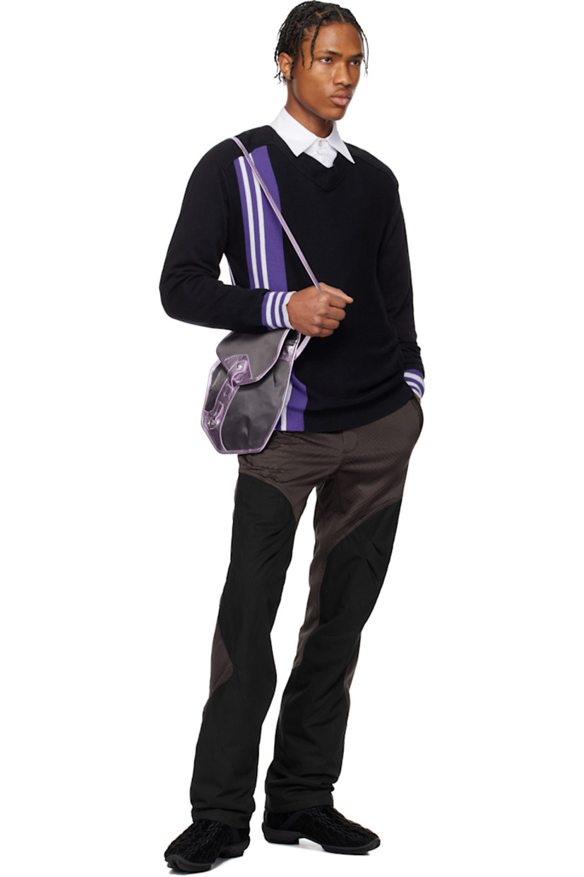 Lyocell- and cotton-blend jersey and barathea trousers. Textured pattern throughout.

· Paneled construction
· Belt loops
· Four-pocket styling
· Zip-fly
· Striped knit trim at front pockets
· Darts at knees
· Zip mesh panels at back legs
· Partially lined

Supplier color: Callisto brown/black sable