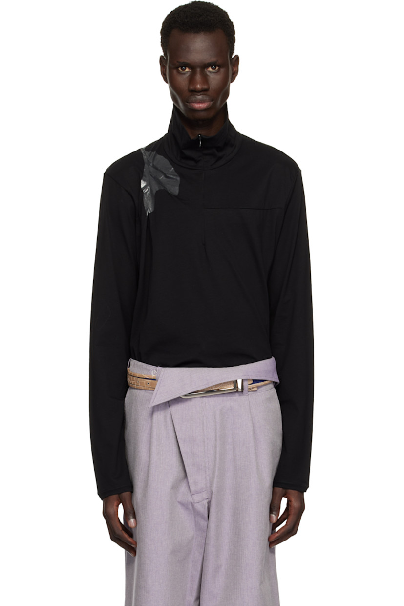 Cotton jersey polo.

· Asymmetrical construction
· Stand collar
· Half-zip closure
· Dart at chest
· Pleats and bonded trim at shoulder and side seam

Supplier color: Black